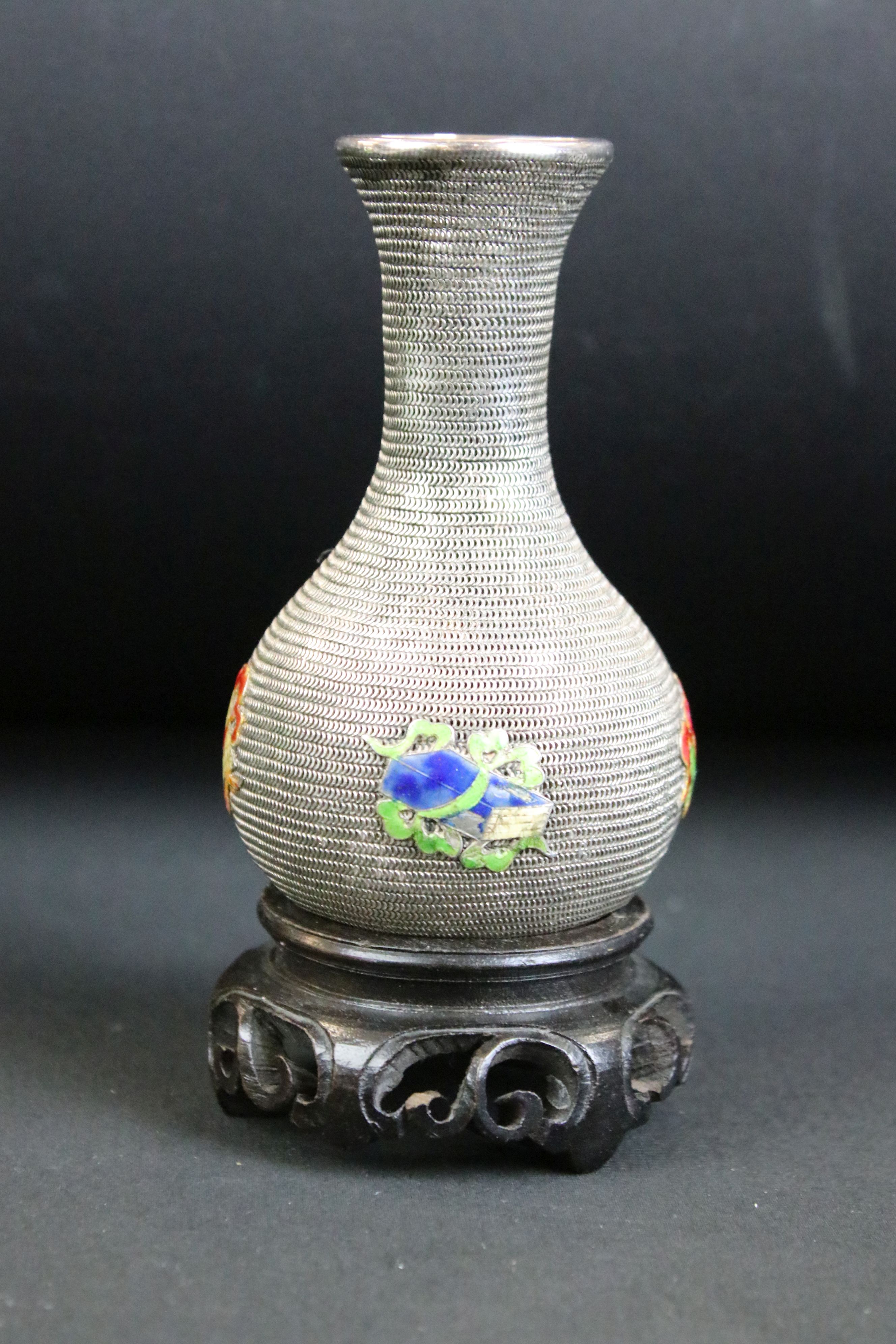 Early 20th Century Chinese white metal vase having a wire work body with enamelled panels to the