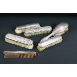 George V silver mounted three-piece brush set of plain polished form with beaded borders, Chester