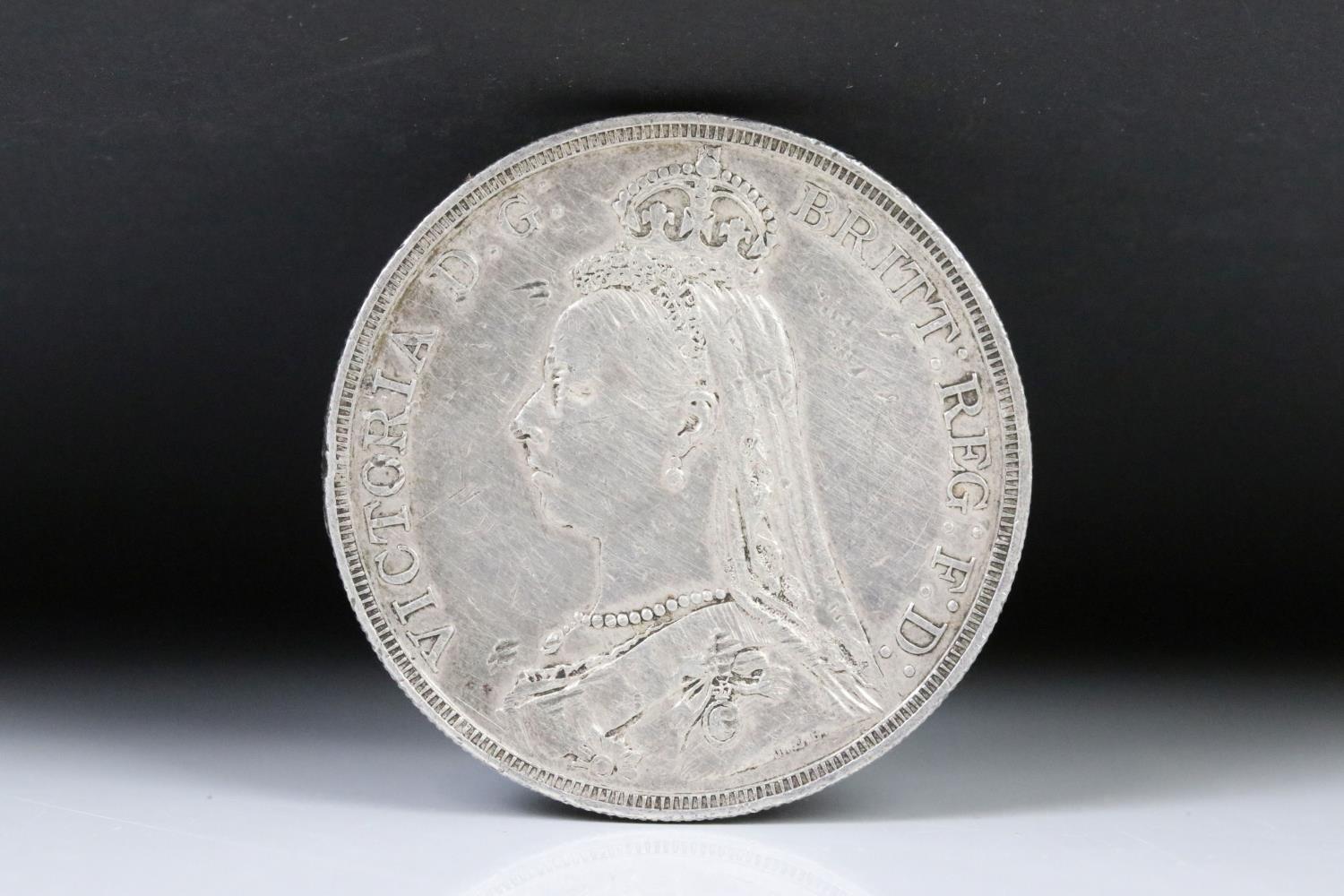 A collection of three British pre decimal silver full crown coins to include 1821, 1887 and 1889 - Image 5 of 7