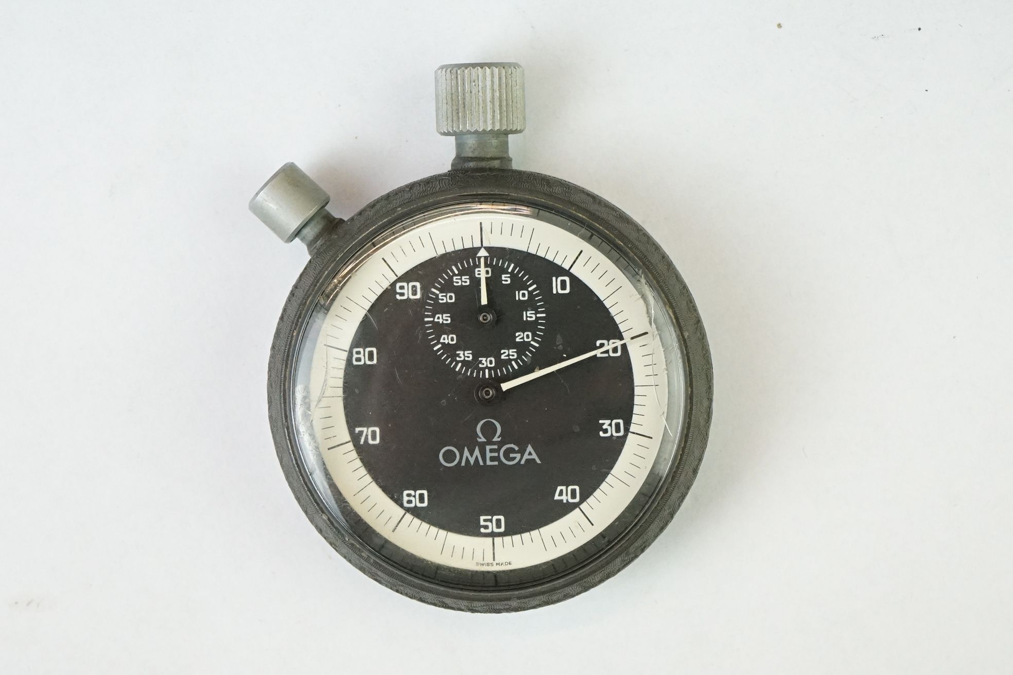 Omega stopwatch, black dial and seconds dial, white Arabic numerals and hands, white outer dial,