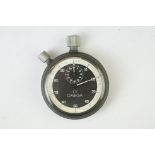Omega stopwatch, black dial and seconds dial, white Arabic numerals and hands, white outer dial,
