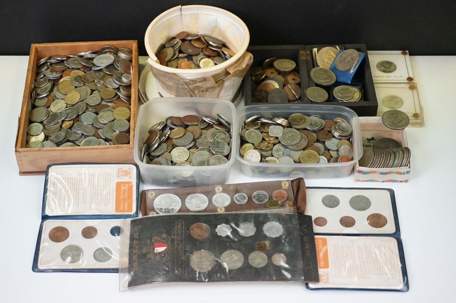 A large collection of mixed British & Foreign coins to include uncirculated examples.