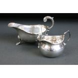 Two 20th Century silver hallmarked jugs. The lot to include a silver hallmarked gravy boat with a