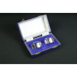 Cased pair of QEII Silver Jubilee napkin rings, hallmarked London 1977 - Da-mar Silverware, approx