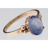 Sapphire and yellow gold ring, the oval mixed cut sapphire measuring approx 9mm x 7mm, four claw