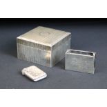 Chinese white metal cigarette box, of square form, vacant cartouche to lid, wooden interior, stamped