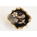 19th century diamond and pearl black enamelled brooch, small rose cut diamond to the pearl flower