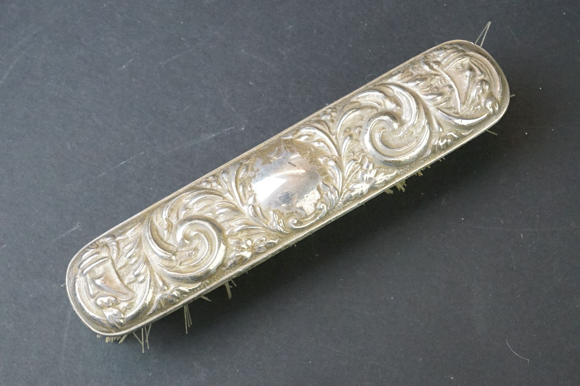 Mid 20th C silver mounted four-piece dressing table brush set with repousse Gothic-style decoration, - Image 5 of 7