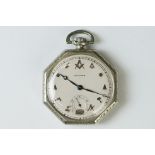 Waltham Masonic white metal octagonal open face top wind pocket watch, the numerals modelled as