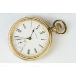 Waltham American Traveler gold plated open face pocket watch. The watch having a white enamelled
