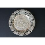 20th Century Chinese Wang Hing silver flower dish of round form with repousse chrysanthemum design