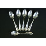 Early 20th Century American silver spoons each having Art Nouveau moulded terminals with engraved