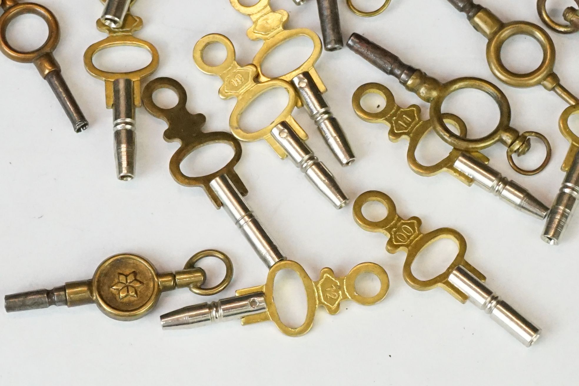 Three 19th Century gold plated pocket watch keys / winders, one having a swivel to top set with - Image 4 of 5