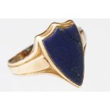 Lapis lazuli yellow gold signet ring, the lapis lazuli head shaped as a shield, vacant cartouche,