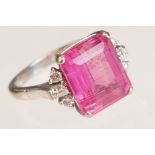 Pink tourmaline and diamond 18ct white gold ring, the rectangular step cut pink tourmaline measuring