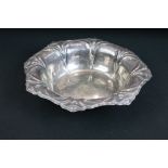 Art Nouveau silver bowl repousse stylised decoration to the ogee border and sides of the bowl,