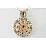 Ruby and fancy coloured topaz 9ct gold pendant necklace, set with rubies, yellow topaz, blue and