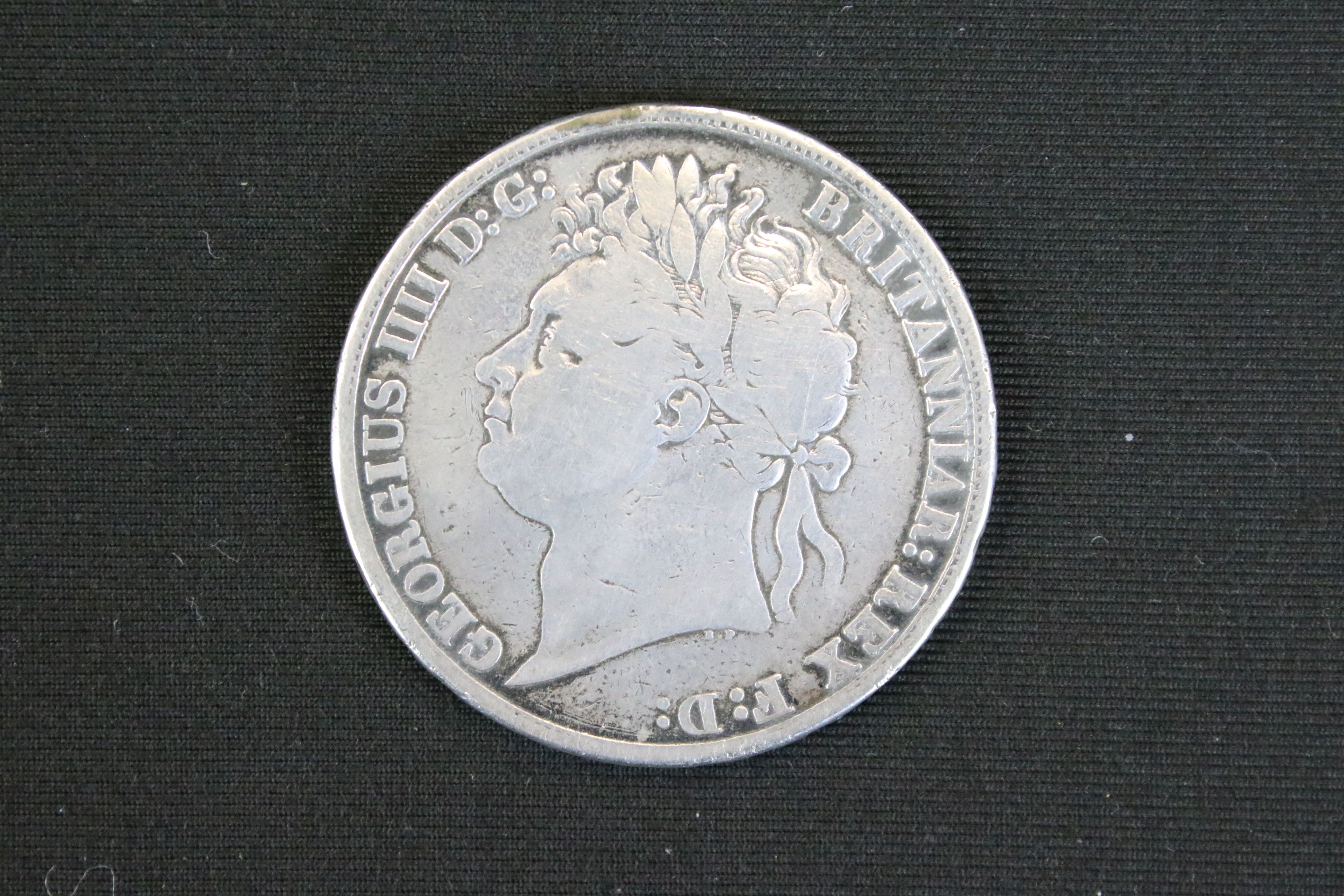 1822 George IIII silver crown having a George and the Dragon and a Laureate bust facing left - Image 4 of 4