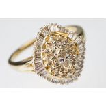Diamond 14ct yellow gold fancy cluster ring, central marquise mixed cut diamond, small round