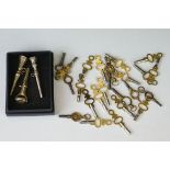 Three 19th Century gold plated pocket watch keys / winders, one having a swivel to top set with