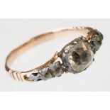 Early 19th century paste unmarked yellow gold and unmarked silver set ring, the old cushion cut
