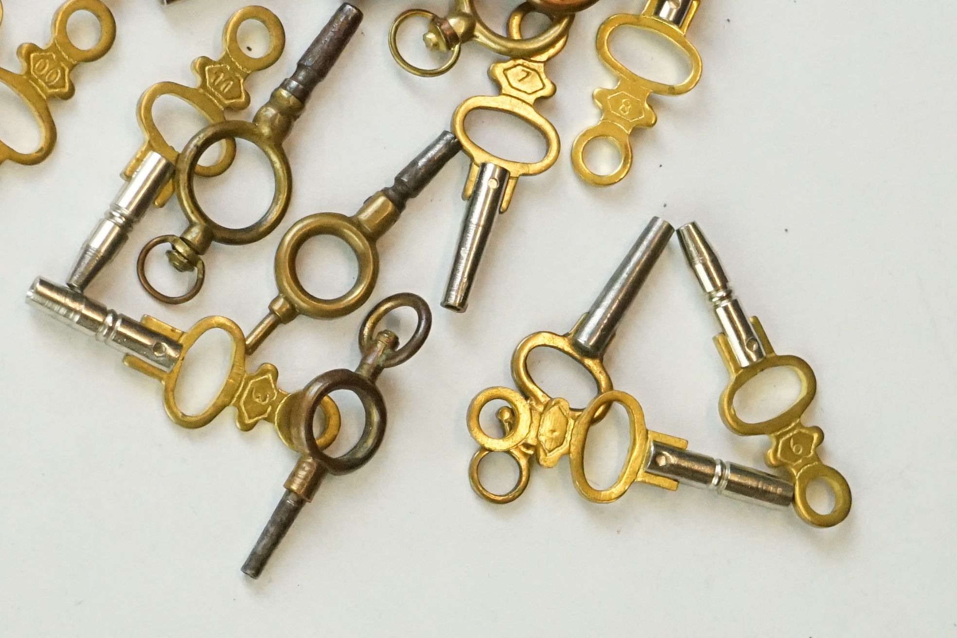 Three 19th Century gold plated pocket watch keys / winders, one having a swivel to top set with - Image 5 of 5