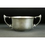 1920s Art Deco silver hallmarked twin handled bowl having moulded acorn handles and a flared rim.