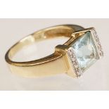 Topaz and diamond 9ct yellow gold ring, the square mixed cut topaz measuring approx 7.5mm x 8mm,