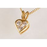 Diamond 18ct yellow gold pendant necklace, the heart shaped pendant set with three round brilliant