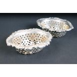 Pair of Victorian silver hallmarked bon bon dishes having pierced sides with repousse floral and