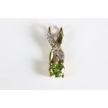 A 9ct gold and peridot ladies pendant.