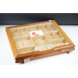 A Willem II dutch cigar counter top display box with hinged glass lid.