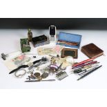 A box of mixed collectables to include vintage pens, watches, mobile phone, medallions, badges,