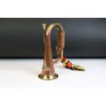 Copper & brass bugle with applied Royal Artillery badge, braided cord tassels. Measures approx. 26cm