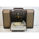 A Crown Stereo Radio & Record Player combination with fold down record player.