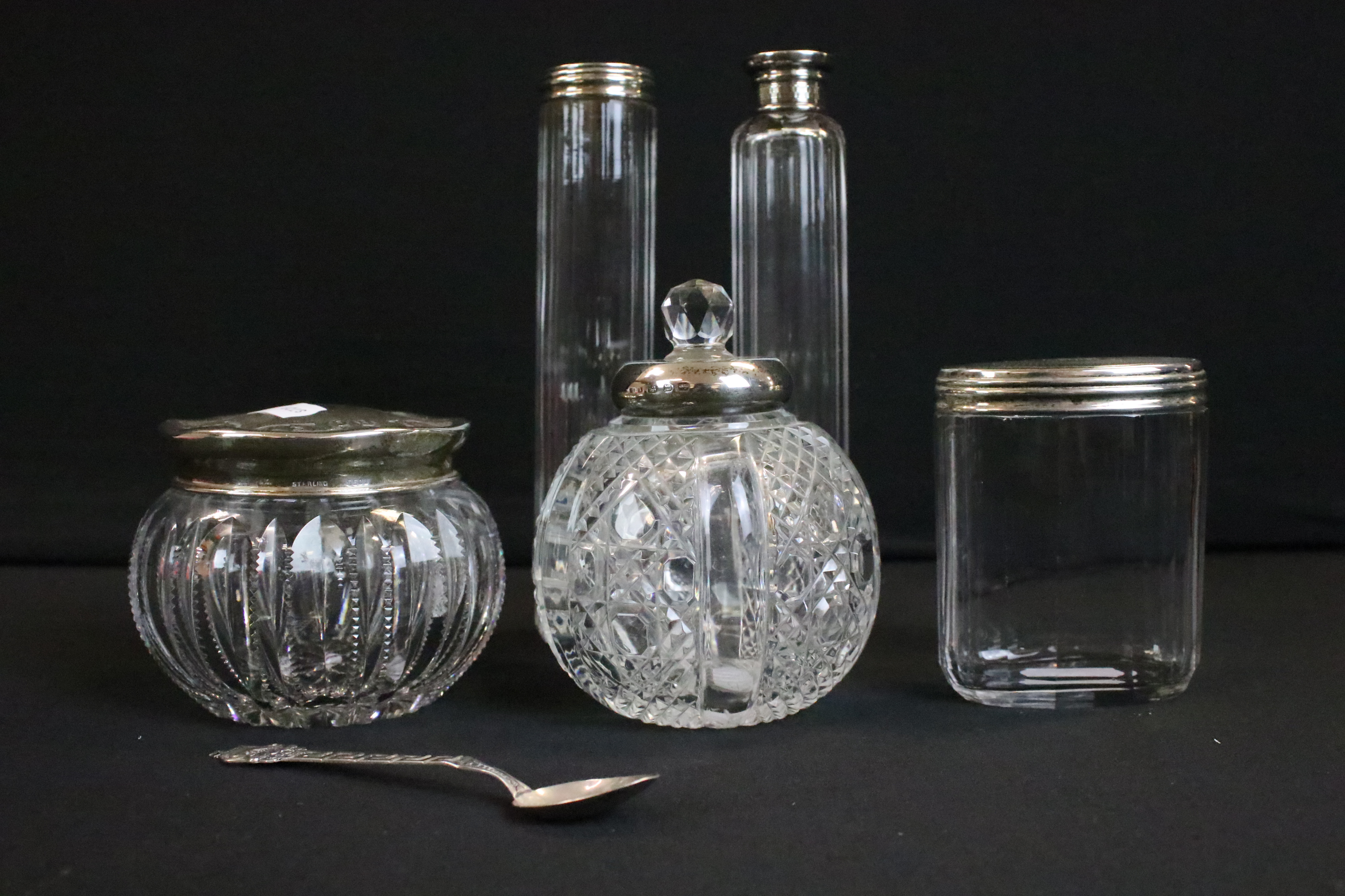 A box of mixed vanity collectables to include fully hallmarked sterling silver topped jars.