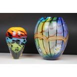 Studio glass tapering vase with mottled rainbow swirl design within a clear glass casing (signed