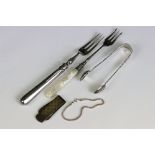 A small collection of mixed sterling silver to include a money clip, sugar tongs and two forks one