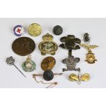 A small collection of mainly military related badges and buttons.