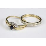 A ladies 9ct gold and sapphire dress ring together with a yellow metal eternity ring.