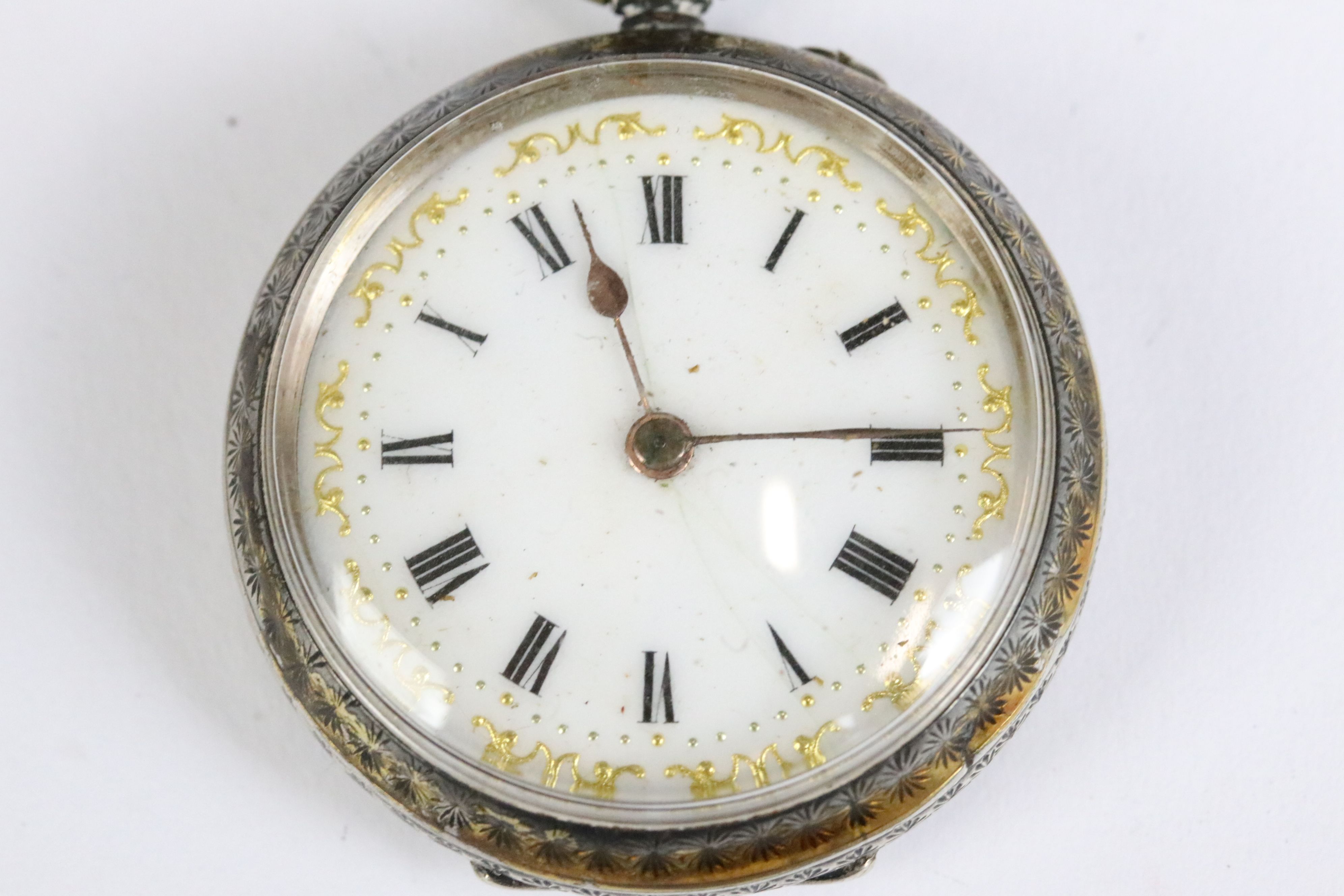 A collection of three silver cased ladies fob watches, two with enamel decoration to the dial. - Image 11 of 13