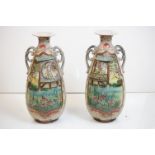 Pair of large Famille Verte twin-handled baluster vases, flared necks, the vases relief moulded with