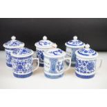 Six Chinese blue and white mugs & covers, three pairs, the designs including floral, foliate and