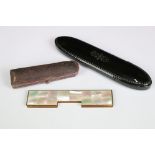 A small group of mixed collectables to include a papier mache spectacles case, comb holder and a