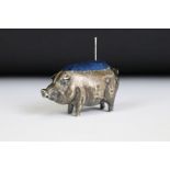 A fully hallmarked sterling silver pin cushion in the form of a pig, assay marked for Birmingham and