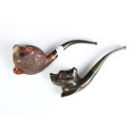 Two novelty smokers pipes with bowls in the form of a bull and a dog