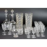 Set of early 20th century etched glassware to include 20 glasses (16 sherry & 4 wine), 2 decanters &