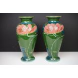Pair of Phoenix Ware vases of inverted baluster, circa 1920's, with stylised floral decoration on