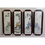 Set of four Chinese ceramic wall plaques, each depicting a man and boy fishing, with character