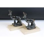 Pair of Art Deco style copper goat bookends, raised on polished stone bases. Measure approx 17.5cm